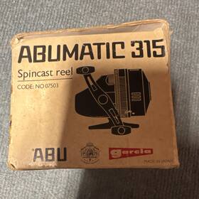 07503 Abu Garcia Abumatic 315 Spincast Reel Red Black Mpn Made In Japan