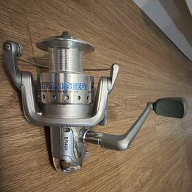 Br406 Bruiser Spinning Reel Silver Metal Line Capacity 15/215 20/170 30/120