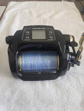 00801399 Daiwa Tanacom 1000 Electric Reel Pre-spooled 100lb Braid