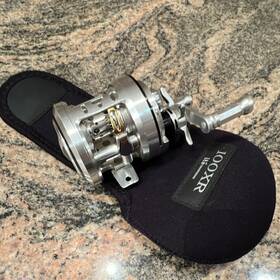 100xr Daiwa Megabass Silver Left-hand Baitcast Reel Size 100 Star Drag With Cover