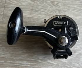P332-5 Newell P332-f Graphite Star Drag Reel Spooled With 65lb Spectra And Rod Clamp