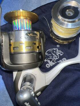 V-55a Okuma With 2 Extra Used Spools Loaded 55lb Powerpro Braid