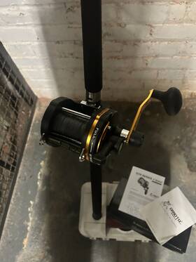 T20-11 Omoto 2 Speed Fishing Reel Loaded With 65 Lb Braid And Custom 6 Pole