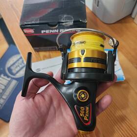 Penn 031324005655 560 Slammer Classic Skirted Pool Spinning Fishing Reel - Read