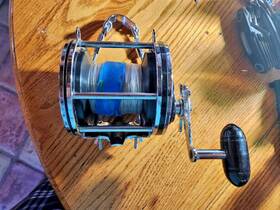 Penn 031324283398 Black Senator 9/0 Reel With Rod Clamp Brace