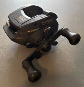 B-111 Shimano Bantam Left-handed Ball Bearing Magnetic Control System. Vg