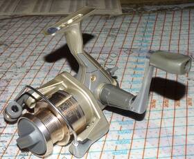 Sym1000 Shimano Aero Symetre 1000 Spinning Fishing Reel With Super Stopper And Dyna-balance
