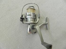 Scmbo-3 Storm Euc Spinning Fishing Reel Silver. Preowned. With Line