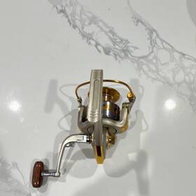 Ef7000 Yumoshi 7000 Spinning Reel Metal Gold Silver Brown