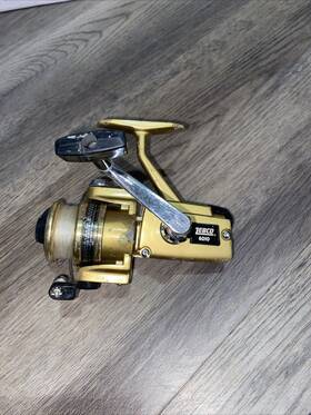 6010 Zebco Model Spinning Fishing Reel - Gold Tone Vintage 80s Made In Japan
