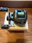 Shimano Bantam Curado 200 Baitcast Reel - Right Handed Box & Paperwork. Fixed Price $100.00.
