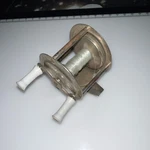 Vintage Casting Fishing Reel Classic Design White Handles Durable Metal Frame. Fixed Price $15.50.