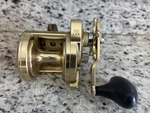 Shimano Trinidad TN20 Gold Saltwater Fishing Reel - Excellent Condition. Fixed Price $365.00.