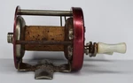 Vintage Red Fishing Reel, Cork Center Etched Fisherman Boat. Fixed Price $14.99.