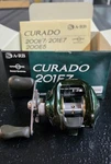 Shimano Curado 201 E7 Baitcast Reel With Box And Paperwork. Fixed Price $300.00.
