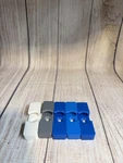 Pack (X15) White Fishing Wall Mount For 3K To 10K Series Spinning Reels. Fixed Price $18.00.