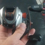 Abu Garcia Revo X Low Profile Baitcast Reel Right 6.4:1 4+1 20LB Silver. Fixed Price $73.00.