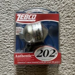 Zebco 202 Spincast Reel Silver/black Pre-spooled Bite Alert Tangle-free. Fixed Price $9.94.