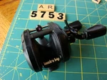 V5753 Ar Ryobi Vmag VM3G Mini Ultra Light Baitcaster Fishing Reel. Fixed Price $35.00.
