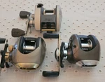 3 Quantum Baitcast Reels. Fixed Price $65.00.