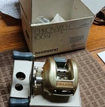 Shimano Chronarch 100SF Gold Right-hand Baitcast Reel 6BB 6.2:1 W/ Box. Fixed Price $249.00.