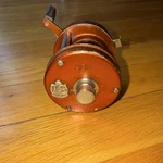 Abu Ambassadeur 4000D Orange Casting Fishing Reel. Fixed Price $80.00.