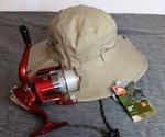 Aoqiusite NL-6000 Fishing Reel And Ozark Trail Hat, Both New. Fixed Price $35.00.