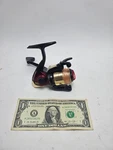 Bass Pro Shops Stampede ST25 Ez Cast Spinning Reel. Fixed Price $19.00.