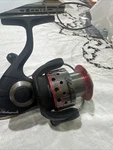Shakespeare Spinning Reel Black Silver Red 5.2:1 Gear Ratio 8LB/220YD 12LB/180YD. Fixed Price $13.99.