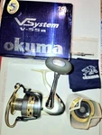 Okuma Vsystem V-55A 15BB Spinning Reel Complete W Spare Spool, Manuals, Cover. Fixed Price $259.95.
