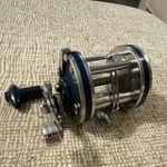Olympic Dolphin 621-LW Vintage Casting Fishing Reel Blue/silver Made Japan. Fixed Price $20.00.
