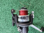 Rhino RSP3 Black And Red Spinning Fishing Reel Action Bin. Fixed Price $8.00.