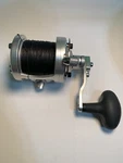 Avet MXL6/4 Mc Raptor Two-speed Lever Drag Reel Right Hand Sn# 27297. Fixed Price $385.00.