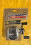 Pflueger Trion TRI62LPB Bait Cast (new-damaged Packaging). Fixed Price $47.00.