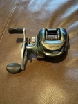 Quantum Energy Burner Baitcasting Reel E770PT Right Hand Retrieve 7.0:1. Fixed Price $80.00.