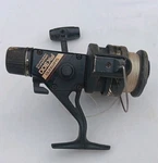 Fishing Shimano FX200 Graphite Spinning Reel With Rear Drag & Quickfire Ii Nic. Fixed Price $25.00.