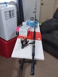 New Spinning Fishing Rod Zebco Bite Alert 7' Mh 17-50LB And Reel HB6004 25LB. Fixed Price $69.00.