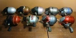 Lot Of 9 Shakespeare Spincast Fishing Reels Parts Repair: Some Working. Fixed Price $24.00.