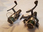 Two Shakespeare Synergy Fishing Reels 3 Bearing System E-z Cast 2840R. Fixed Price $19.95.