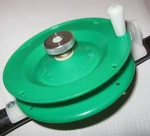 Schooley's De-ma-reel Ice Fishing Green. Fixed Price $11.99.