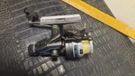 Shakespeare Alpha X040 Spinning Reel. Fixed Price $5.00.