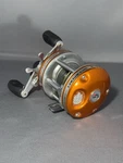 Abu Garcia Ambassadeur 5600CL Rocket Orange 6.3:1 Baitcasting Fishing Reel Rh. Fixed Price $109.95.