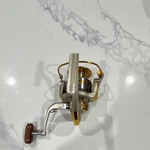 Yumoshi EF7000 Spinning Reel Metal Gold Silver Brown. Fixed Price $20.00.