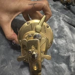 Shimano Trinidad TN20 Gold Conventional Casting Reel. Fixed Price $345.00.