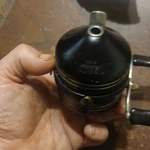 Zebco Black Closed-face Spincast Fishing Reel W/ Dual Handle Knobs. Fixed Price $18.00.