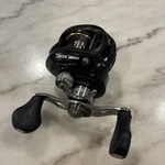 Lews M58 Bait Casting Reel TS1H Speed Spool Tournament 10 Bearing System 6:4:1. Fixed Price $120.00.