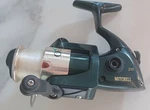 Mitchell Outback 20 Graphite Body Spinning Reel. Parts Only. Missing Handle. Fixed Price $5.90.