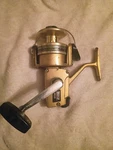 Vintage Zebco 6050 Skirted Gold Spinning Fishing Reel Works Great. Fixed Price $25.99.