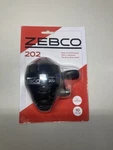 Zebco 202 - Spin Cast Fishing Reel Size 10LB Line New Sealed. Fixed Price $13.99.