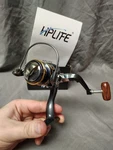 Spinning 5.2:1 HL2000 Fishing Reel With Manual And Box Never Used. Fixed Price $11.99.